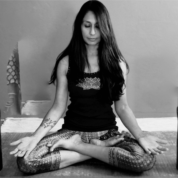 black and white pic of woman meditating